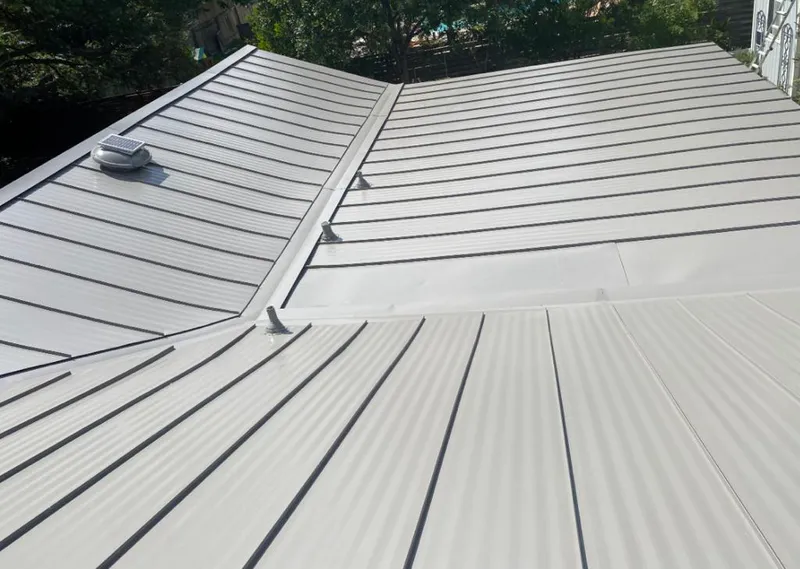 Solar attic fan installed on a metal roof for Roof Ventilation in American Canyon